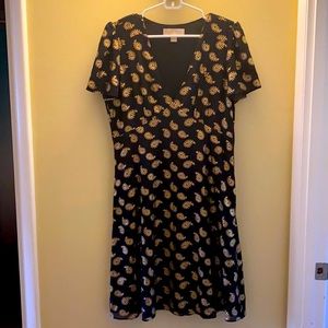Michael Kors black short-sleeved dress with gold designs